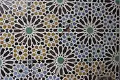 Twelve-pointed star motifs in zellij tilework at the Saadian Tombs, Marrakesh