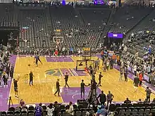 Players shooting in an emptied stadium