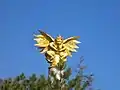 The statue of a bird immortal sacred to the Naxi people.