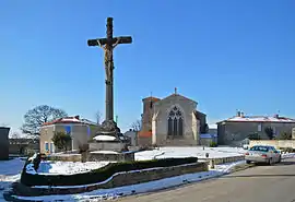 The calvary and the church, in Saint-Michel-le-Cloucq