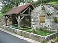 Village fountain and lavoir (washing basin) in Saint-Lothain (Jura)