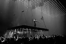 West performing during the Saint Pablo Tour in 2016.