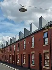 Image 23Much of Greater Manchester's housing stock consists of terraced houses constructed as low-cost dwellings for the populations of local factory towns. (from Greater Manchester)