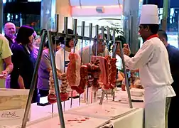 Assortment of raw meats being set up for churrascaria grilling