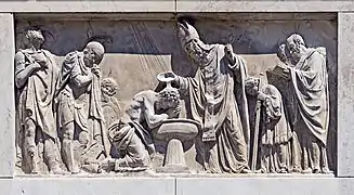 Bas-relief on the facade right, by Bartolomeo Ferrari.