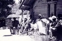 Rum is poured out in an ancestor ritual