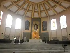 Main altar, with a mosaic of Saint Dominic