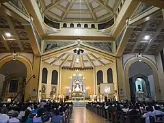 The sanctuary with the La Naval de Manila image enshrined at the main altar