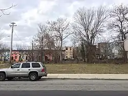 1100 block of Saratoga Street, with row of alley houses on 1100 block of Sarah Ann Street visible behind, in Poppleton, Baltimore