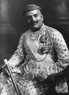 Sayajirao Gaekwad III, Maharaja of Baroda, wearing the sash and star of a GCSI, as well as the star of a GCIE, 1919