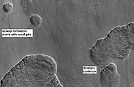 Stages in scalop formation, as seen by HiRISE.  These formations probably form from the sublimation of ground rich in pure water ice many meters in depth.