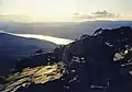 View from the summit of Schiehallion looking over Loch Rannoch into the setting sun