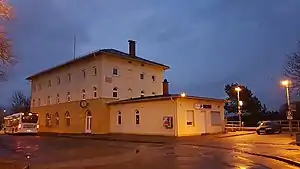 Three-story building with hipped roof