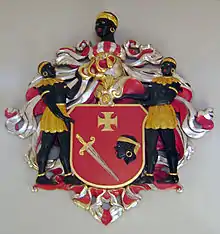 Coat of arms of the Guild of Blackheads representing Saint Maurice, patron saint of the guild.