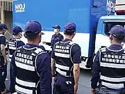 SeRT officers in a briefing prior to participating in humanitarian operations in Atami, Shizuoka after the landslides