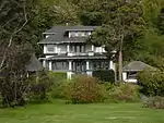 The Satterlee House (1906) at 4866 Beach Drive SW in West Seattle, one of the grander examples of the Foursquare or Box style