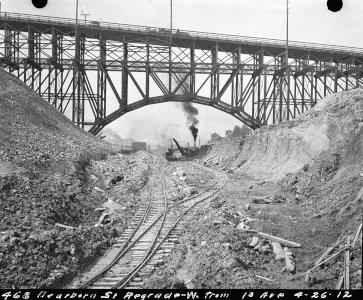 The Dearborn Regrade in progress, 1912. Looking west, towards the 12th Avenue South Bridge/Jose P. Rizal Bridge, constructed the previous year.