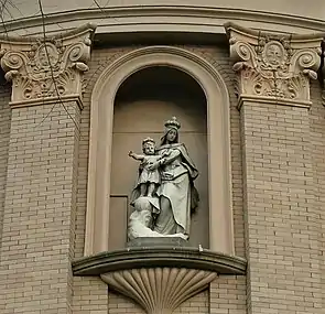 Statue of Mary with the child Jesus on the building's exterior