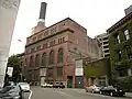 Post Station in the Pioneer Square neighborhood, steam plant built by Stone and Webster, now owned by Seattle Steam Company. The lower Old Post Station at right was built circa 1890; the tall portion, New Post Station, in 1902.