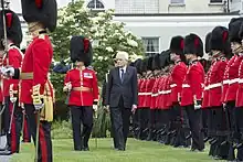 The Governor General's Foot Guards' full dress trousers are midnight blue with a scarlet stripe.