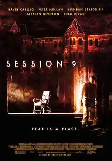 Dark, brown-tinted and horror-themed image of a man in an asbestos-removal suit (to the right side of the poster), with an image of a chair (in the middle of the image) and an image of a large castle-like building at the top of the image. The text "Session 9" is emboldened in white text in the middle of the image, and near the bottom of the image is written, "Fear is a place."