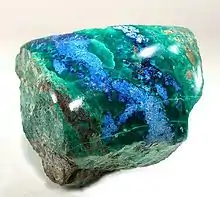 Polished shattuckite with malachite, New Cornelia mine, Ajo, Arizona. Size 5.3×5.1×5.0 cm