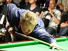 Shaun Murphy playing a shot