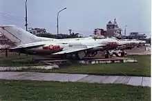 Shenyang J-6 and 2 Mig 21s