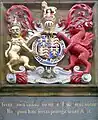 The arms of Edward VI above a school doorway