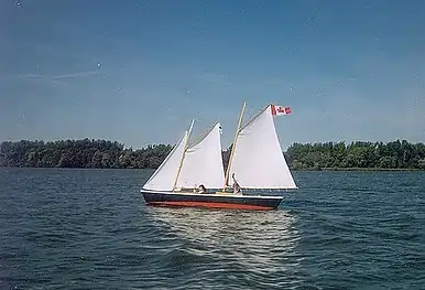 Close-hauled: the flag is streaming backwards, the sails are sheeted in tightly.