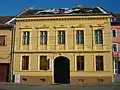 Neoclassical building with eyes (Sibiu)