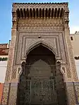 The monumental ornate wall fountain in the southeast courtyard