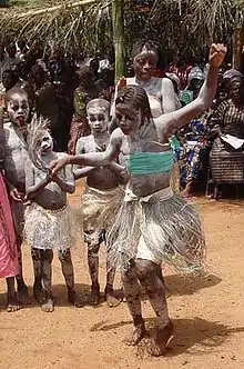 Students celebrate with traditional dancing in Koindu, Kailahun District, Sierra Leone