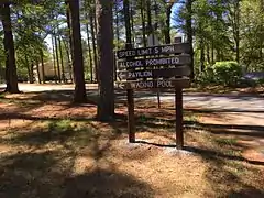 Sign near the entrance directs visitors to the Pavilion and Wading Pool