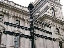 Image 20A signpost on Parliament Square with directions for nearby attractions (from Tourism in London)