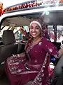 Sikh bride wearing purple lehenga and  dastaar for Anand Karaj