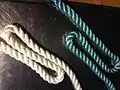 1 : Both hands holding the rope, thumbs are used to form a Z with the rope