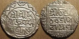 Silver taka with Bengali script