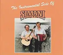 Bud Davidge (left) and Sim Savory (right) pose for the cover of their late CD; The Instrumental Side.