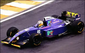 In 1995, Simtek gained support from the Energy Drink XTC and Men's Tenoras, a Japanese men fashion brand that was Hideki Noda's sponsor in F3000. This is Domenico Schiattarella driving his S951 in 1995.