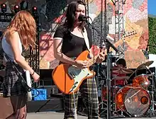 Skating Polly performing in September 2018. From left to right: Kelli Mayo, Peyton Bighorse, and Kurtis Mayo.