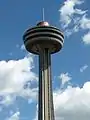 A view of the upper portion of the tower with dome newly polished back to its original copper.