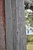 Corner post of undressed timber