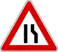 Road narrows on right side