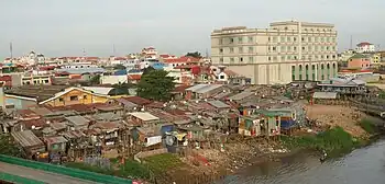 Shanty town beside water