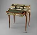 Small writing desk (bonheur-du-jour) by Martin Carlin at the Met Museum, drawers open, circa 1774