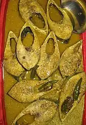 Sorshe Ilish, a dish of smoked ilish with mustard-seed paste, has been an important part of both Bangladeshi and Bengali cuisine.