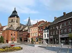 The Saint-Vincent collegiate church [fr] (10th century) and the square on the "Place Verte"