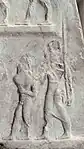 Detail of a soldier escorting a prisoner