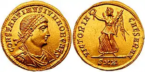 Image 59Solidus issued under Constantine II, and on the reverse Victoria, one of the last deities to appear on Roman coins, gradually transforming into an angel under Christian rule (from Roman Empire)